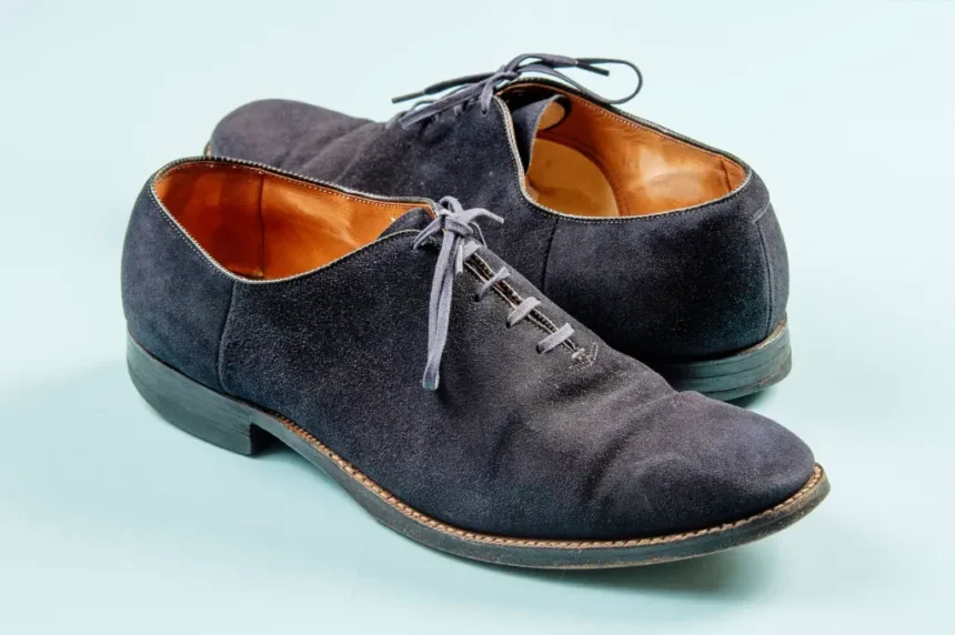 Elvis Presley’s legendary blue suede shoes sell for over $150k at auction